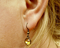 потерять сережку с левого уха примета